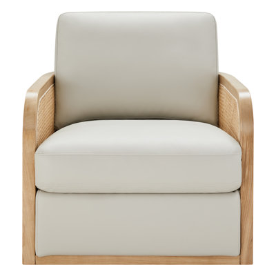 Juliette Faux Leather Natural Cane Swivel Barrel Chair