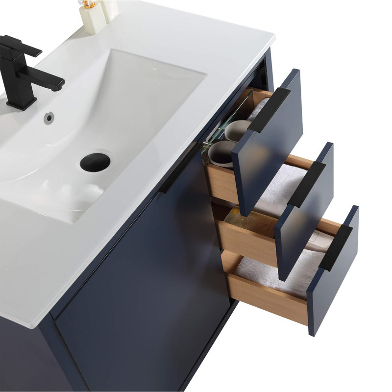 Navy Blue Matte Bathroom Vanity with White Ceramic Sink and Black Hardware