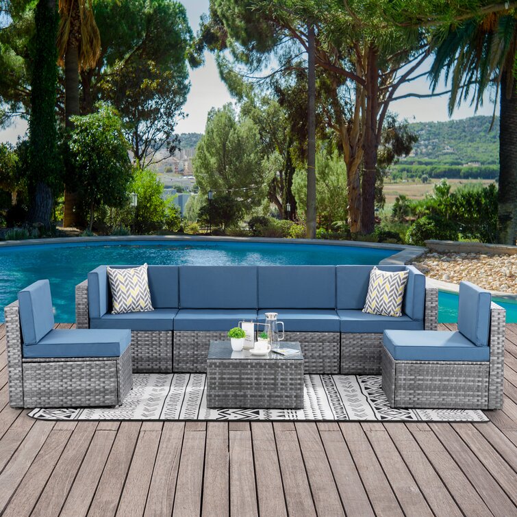 https://assets.wfcdn.com/im/83141924/resize-h755-w755%5Ecompr-r85/1579/157989145/7+Piece+Rattan+Seating+Group+with+Cushions.jpg