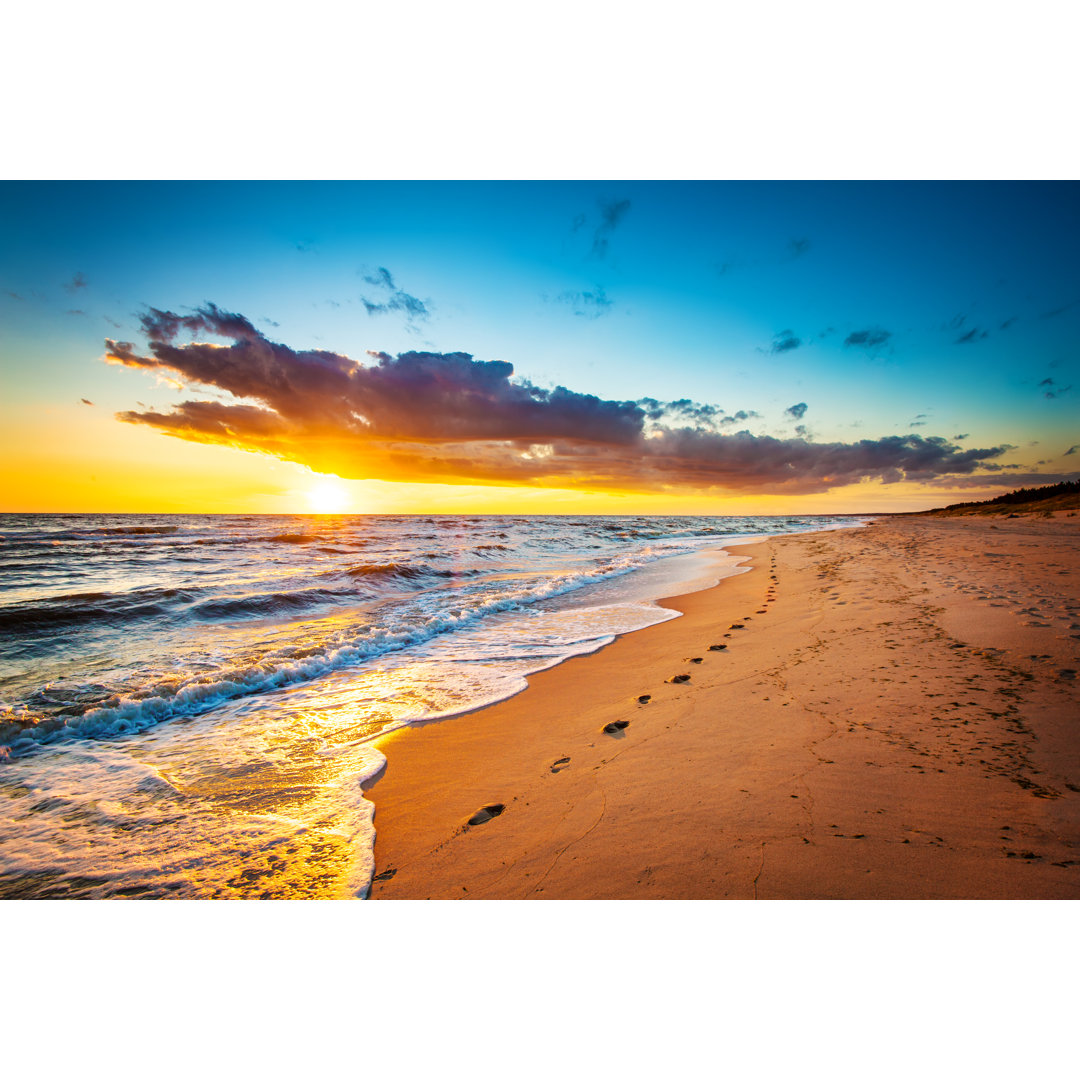 Fußspuren auf dem Sand - Leinwandbild