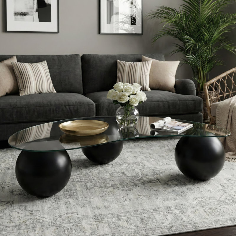 Bean Shaped Glass Top Coffee Table with Sculptural Ball Base for Modern Living Rooms, Black
