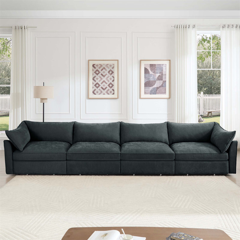 Canapé pour 4 personnes super confortable et fonctionnel avec tiroirs de rangement sous chaque siège, idéal pour les réunions de famille
