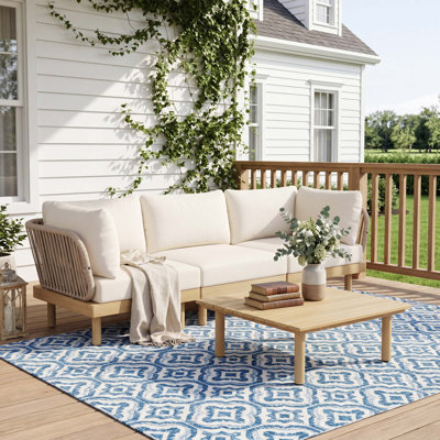 4-Piece Acacia Wood Outdoor Sofa Set with Rope Backrest and Weather-Resistant Cushions for Durable, Comfortable, and Flexible Patio Seating.