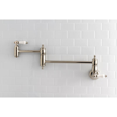 Kingston Brass Restoration Two-Handle 1-Hole Wall Mount Pot Filler Faucet