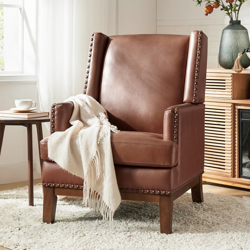 Fauteuil à oreilles Ariston en cuir véritable avec pieds en bois massif, Brun