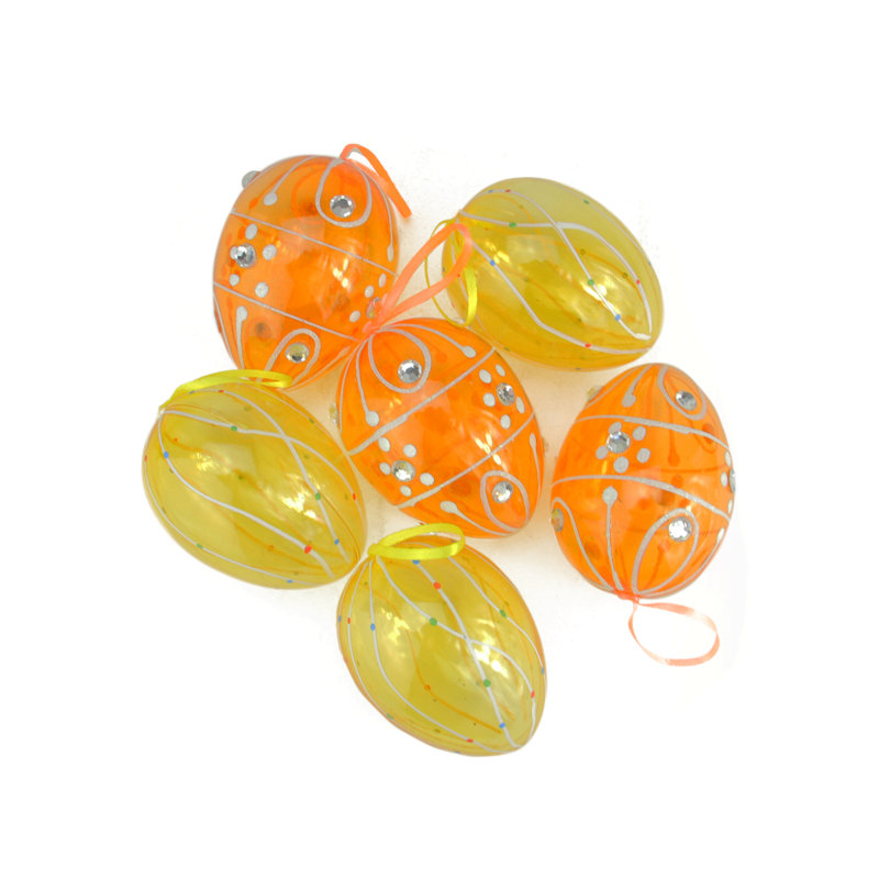 Ornement en forme d'œuf de Pâques transparent avec paillettes jaune et orange