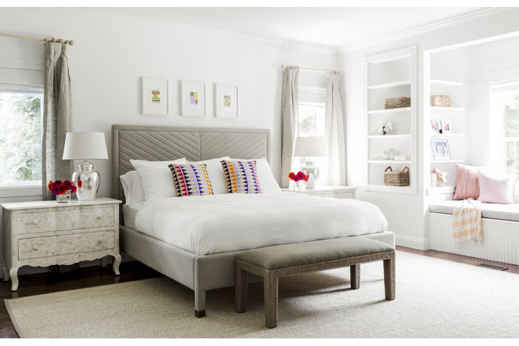 A white bedroom with gray accents
