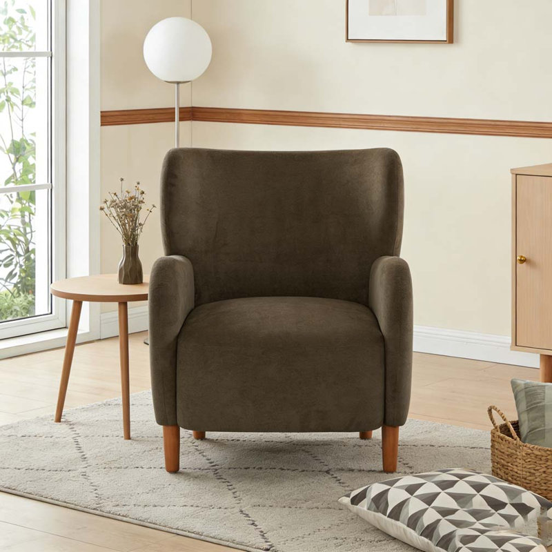 Fauteuil club rembourré à oreilles