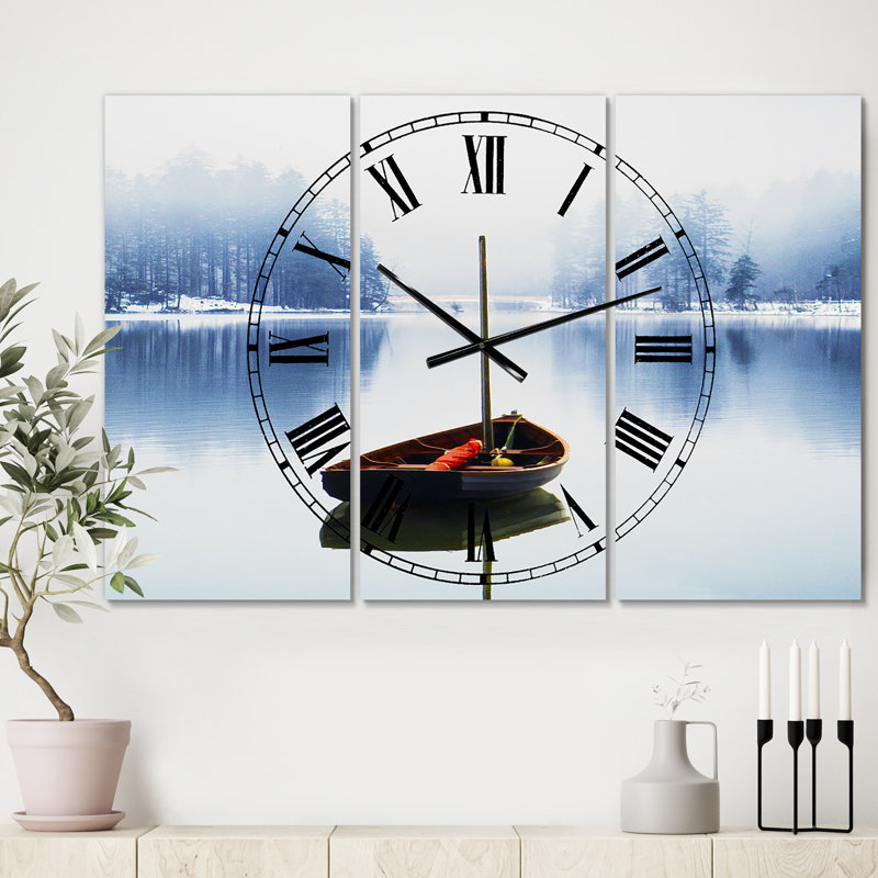 Horloge murale 3 panneaux Empty Boat On Blue Lake