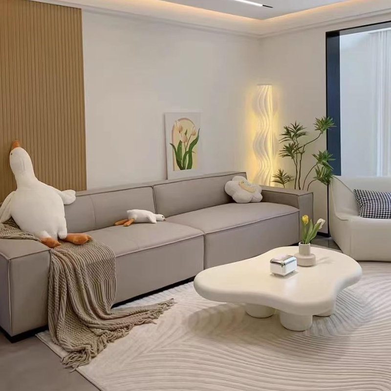 Clouddream Cream Table - A Sleek, Nordic-Inspired Piece With A Unique Irregular Design. Perfect For Small Spaces, It Adds Modern Elegance And Functionality To Any Room.
