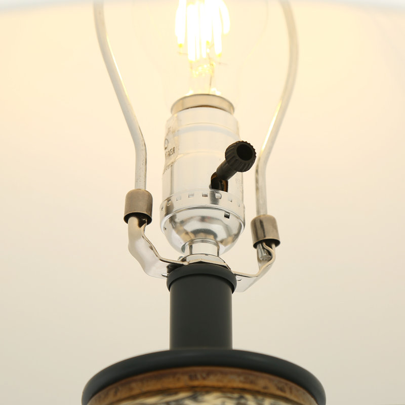 Lampe de table ronde moderne en porcelaine à une lumière avec abat-jour plissé en lin pour coin lecture
