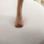 Repose-pieds rond avec rangement en velours ivoire