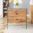 Double-Drawer Bedside Table. The Board Surface Is MDF With Wood Grain Sticker, And Both Sides Are Transparent Tempered Glass. The Design Is Simple And Elegant, With Excellent Storage Functions.
