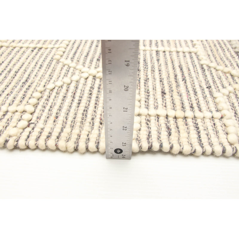Tapis rectangulaire nouvel âge en laine Hatsue de conception unique 5 pi x 8 pi crème