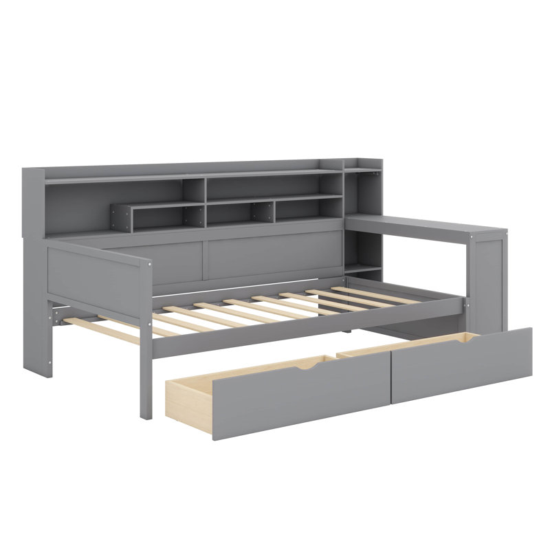 Lit de jour en bois équipé de tablettes de rangement, d'un design multifonctionnel comprenant deux tiroirs de rangement et un bureau d'étude