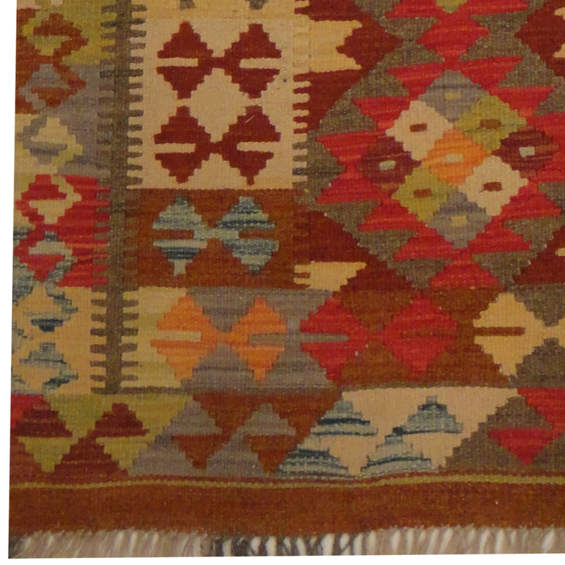 Tapis brun / rouge / vert Kilim