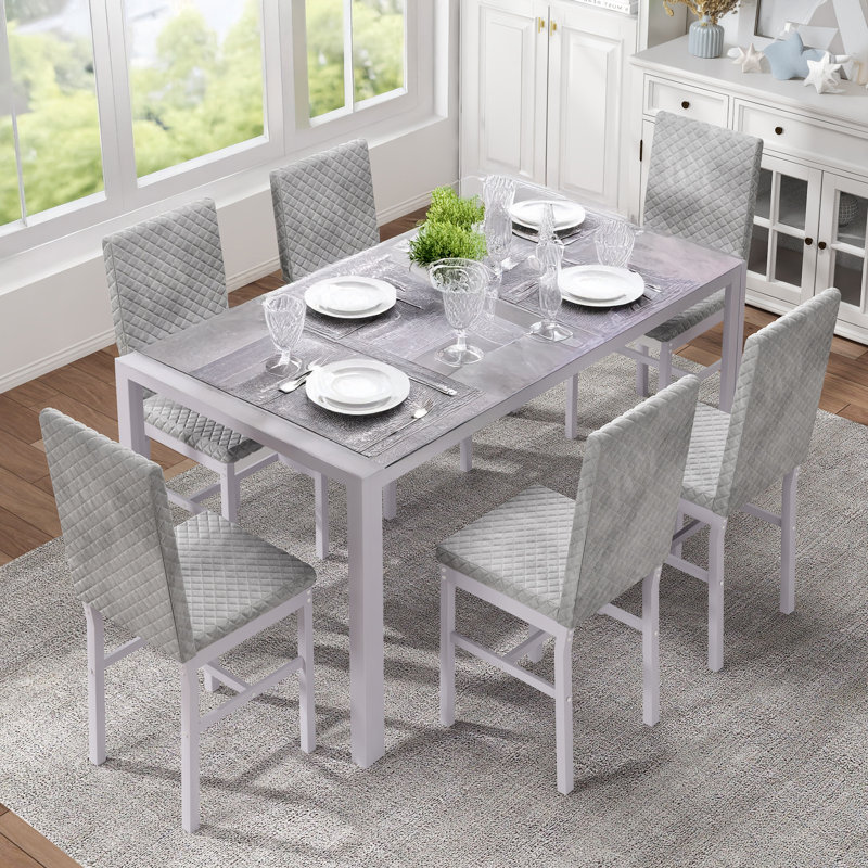 Ensemble de table et chaises de salle à manger de style moderne et contemporain 7 pièces, plateau de table en verre trempé et ensemble de table de salle à manger robuste en métal avec 6 chaises de salle à manger rembourrées sans accoudoirs, ensembl