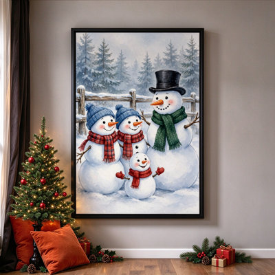 Famille de bonhommes de neige dans un paysage hivernal féerique, tableau sur toile encadré, cadre noir, 50 x 75 cm