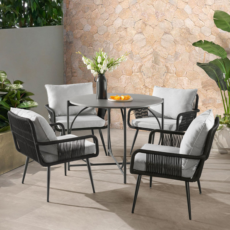 Almaraz Modern All-Weather Outdoor Dining Set with 4 Woven Rope Chairs with Cushions and 42" Round Faux Concrete Bistro Table