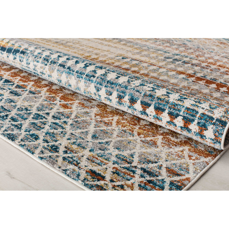 Ivory and Blue Rectangular Abstract Synthetic Area Rug