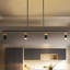 Suspension moderne à 4 spots DEL linéaires avec têtes orientables pour îlot de cuisine