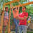 Overland Heights Wooden Swing Set, 2 Slides, Monkey Bars, Rock Wall & Café Window with Bench