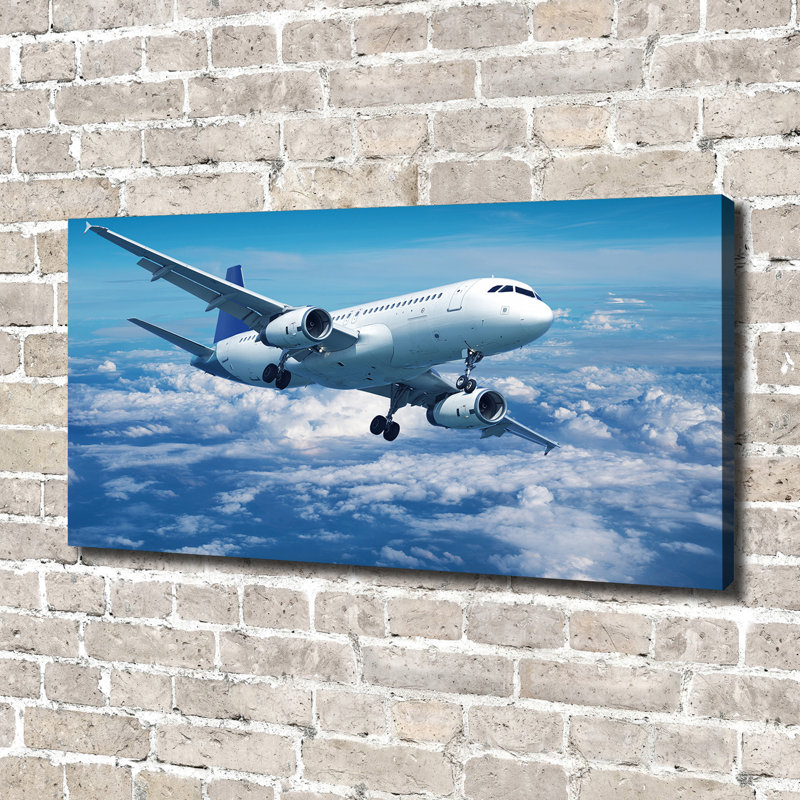 Airplane In The Clouds - Wrapped Canvas Print