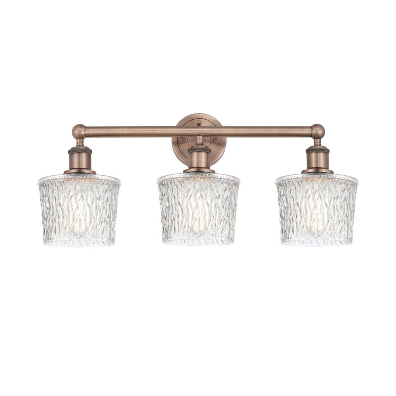 Éclairage pour meuble-lavabo de salle de bain 3 lumières 24,5 pouces Pascaline, Cuivre antique