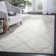 Tapis beige à motif géométrique Ammundsen