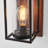 1-light Outdoor Wall Sconce With Cylindrical Seeded Glass