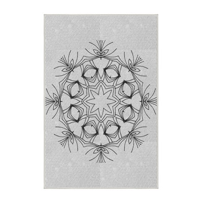 Tapis blanc/noir à motifs