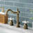 Kingston Brass Heritage Two-Handle 3-Hole Deck Mount Widespread Bathroom Faucet with Pop-Up Drain-29272856