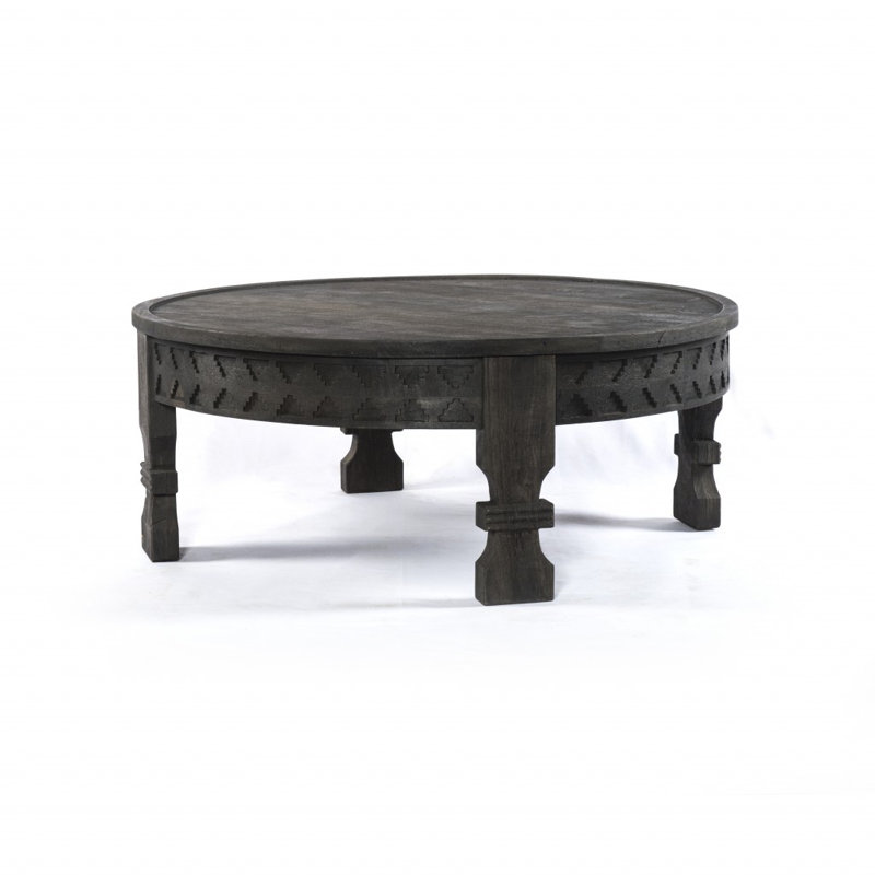 Table basse ronde en bois sculpté noir