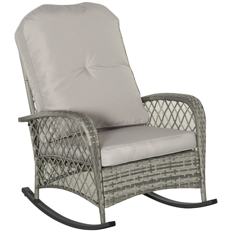 Chaise berçante d'extérieur en osier avec coussins
