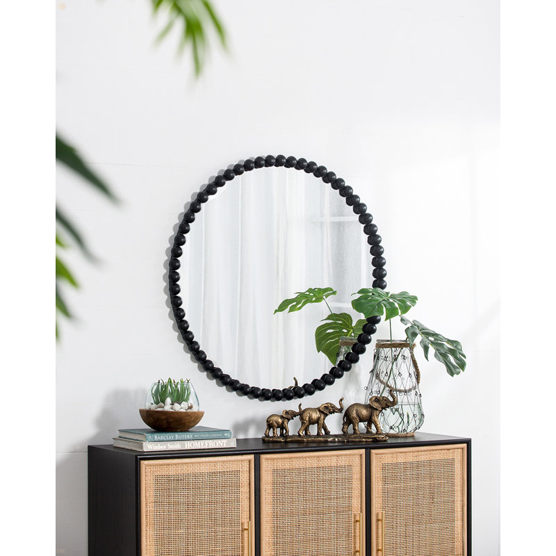 Miroir circulaire avec cadre perlé en métal pour le salon