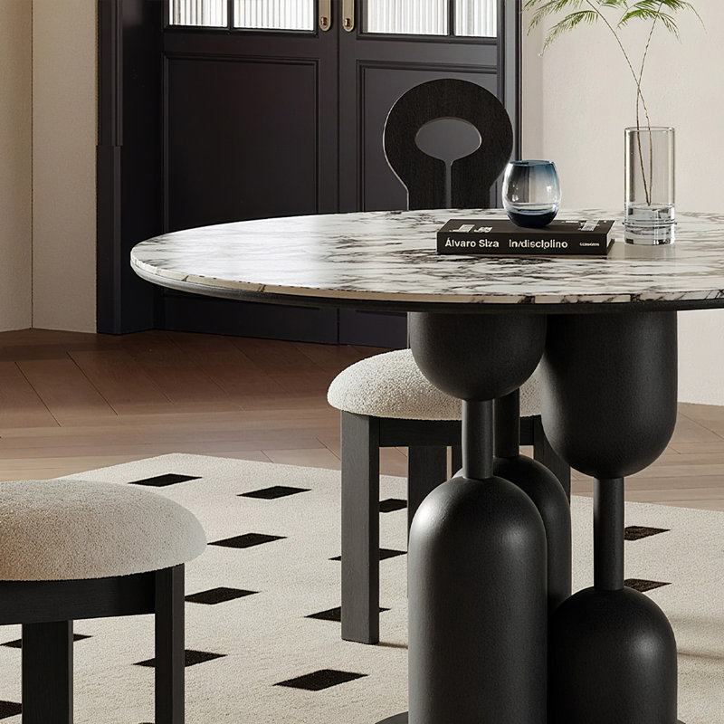 Orren Ellis Black Round Sintered Stone Dining table - Wayfair Canada