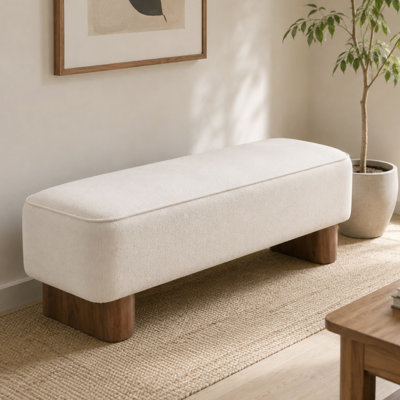 Banc ottoman capitonné avec assise rembourrée et pieds en bois massif