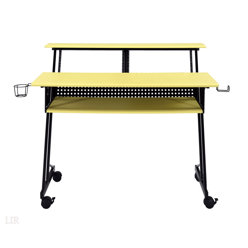 Bureau de studio de musique jaune et noir avec plateau à clavier, parfait pour les environnements d'enregistrement et l'esthétique améliorée.