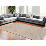 Tapis moderne brun clair à motif de losanges gris