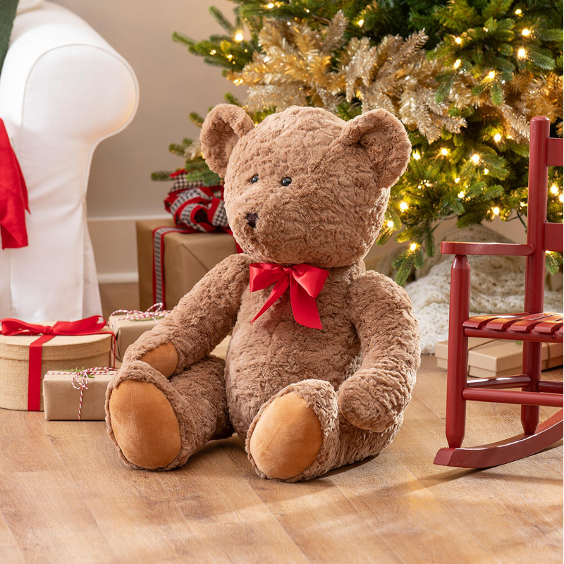 Ours en peluche surdimensionné avec nœud