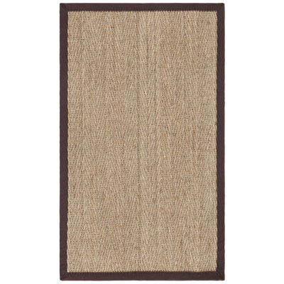 Heenan Natural Fiber Seagrass Solid Color Rug