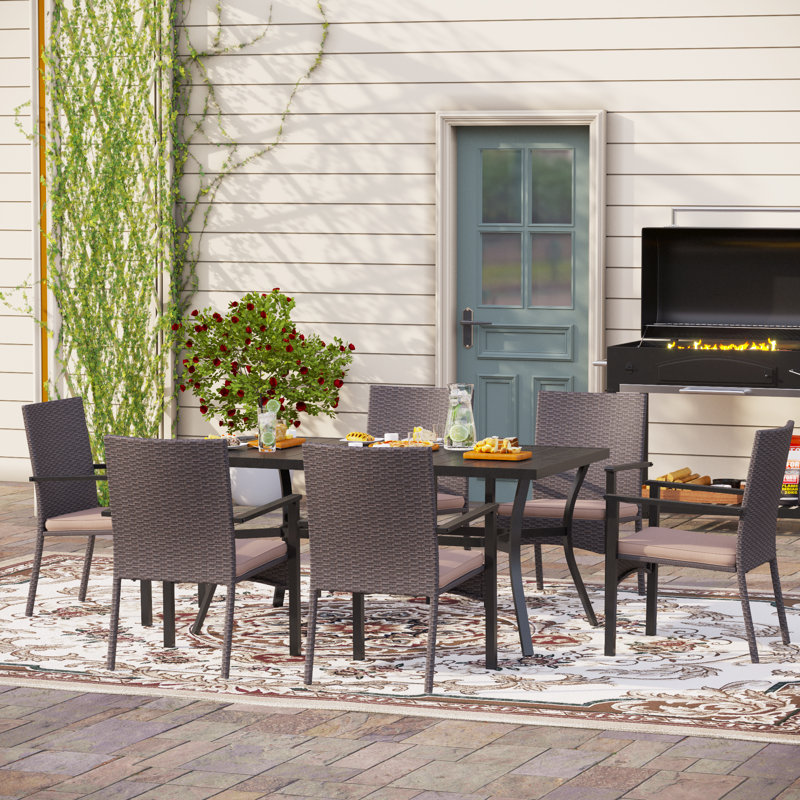 Argyri 6 - Person Patio Dining Set with Rectangular Table , Cushions Included