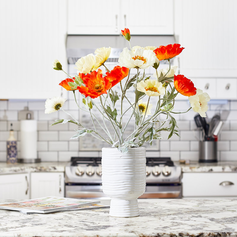 Arrangement floral coquelicot en pot