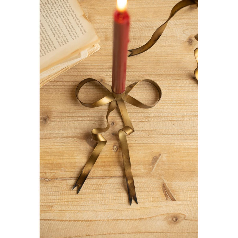 ENSEMBLE DE DEUX PORTE-BOUGIES ANTIQUE EN LAITON, 1