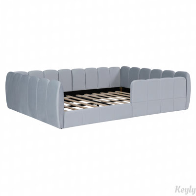 Lit tapissier en velours avec garde-corps