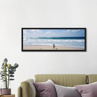 Surfer Standing On The BeachNorth Shore, Oahu, Hawaii, USA On Canvas by Panoramic Images Gallery-Wrapped Canvas Giclée