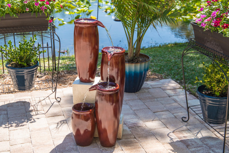 red ceramic multi-level outdoor fountain