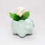 Petit pot de fleurs vert éléphant