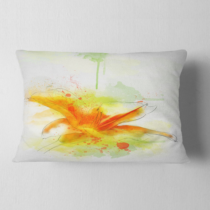 Coussin décoratif à fleurs jaunes et rouges avec éclaboussures de couleur