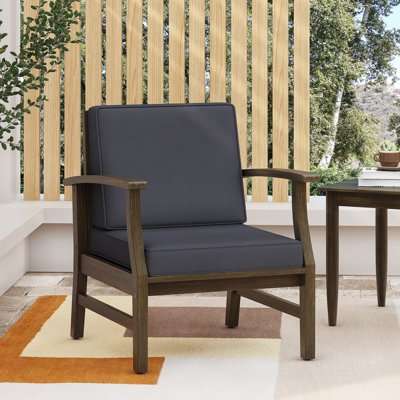 Fauteuil club confortable en bois d'acacia avec coussin résistant à l'eau pour la détente
